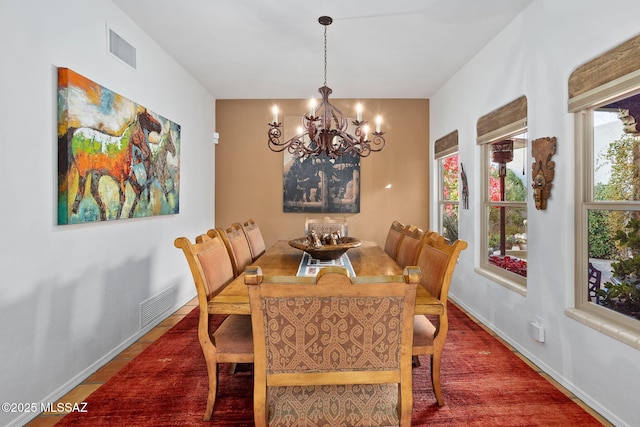 dining room featuring a chandelier