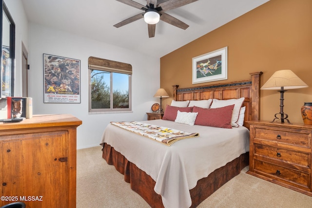 bedroom with ceiling fan and light colored carpet