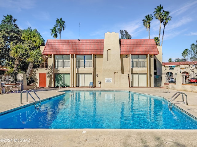 view of pool with a patio