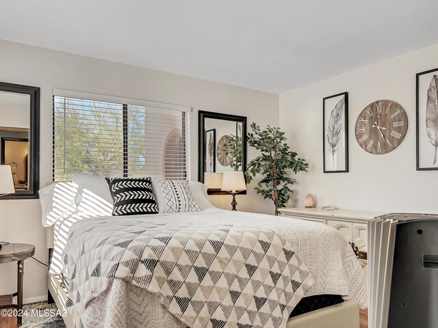 bedroom featuring wood-type flooring