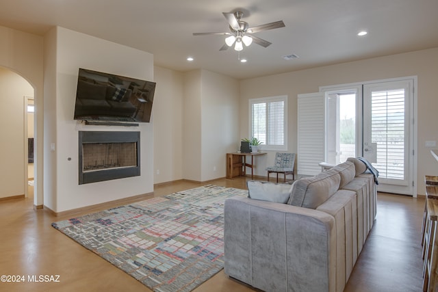 living room with ceiling fan