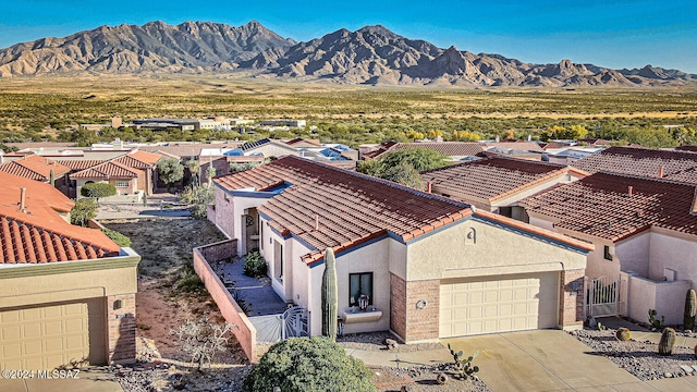 bird's eye view with a mountain view