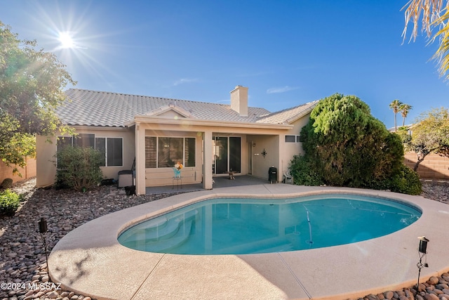 pool featuring a patio area