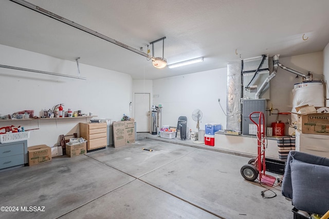 garage with heating unit and a garage door opener