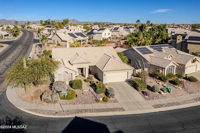 aerial view with a residential view and a mountain view