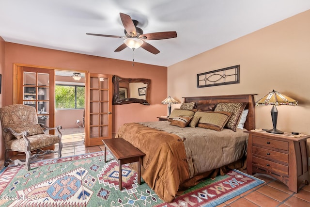 bedroom with french doors, ceiling fan, and light tile patterned floors