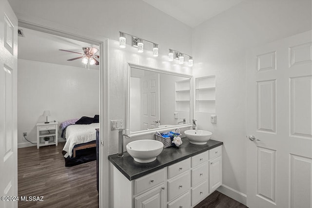 bathroom featuring vanity, hardwood / wood-style flooring, and ceiling fan