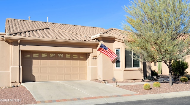 view of front of home with a garage