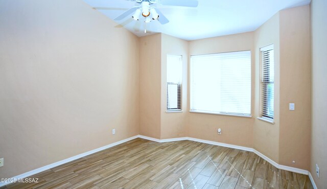 bedroom with light hardwood / wood-style flooring and ceiling fan