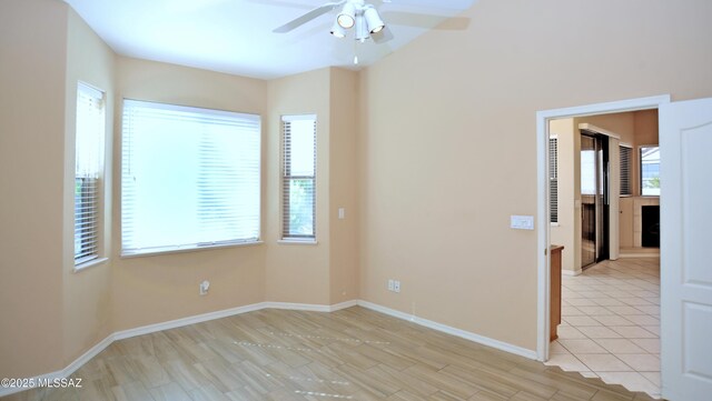 office space featuring ceiling fan and light hardwood / wood-style flooring