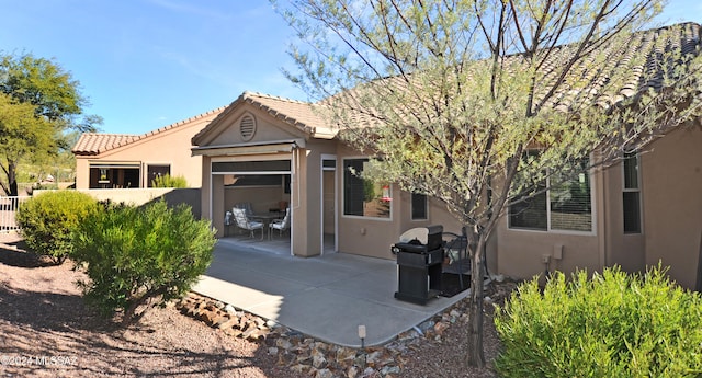 view of front of home featuring a patio