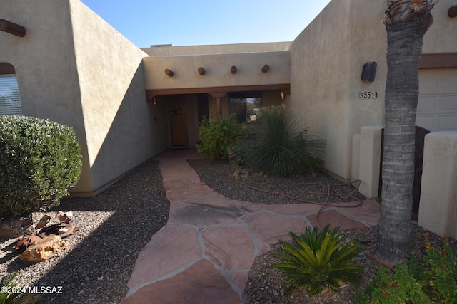 property entrance featuring a garage