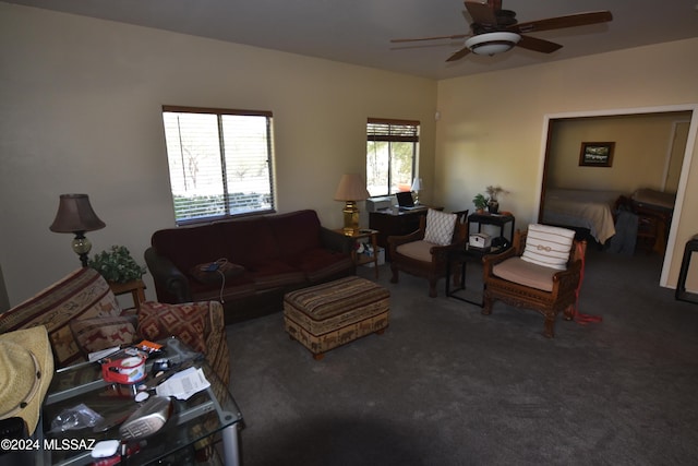 carpeted living room featuring ceiling fan