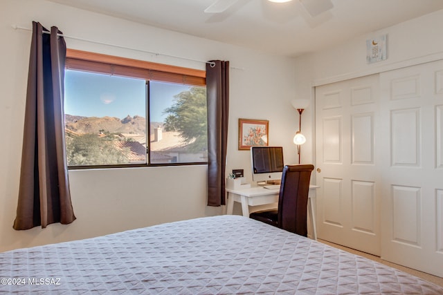 bedroom featuring ceiling fan