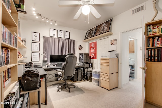 home office with light colored carpet and ceiling fan