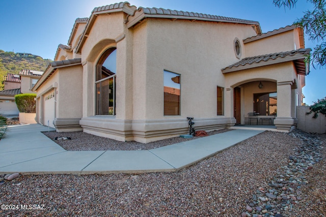 view of front of property with a garage