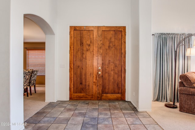 foyer with carpet