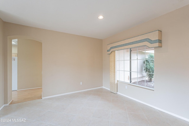 view of tiled spare room