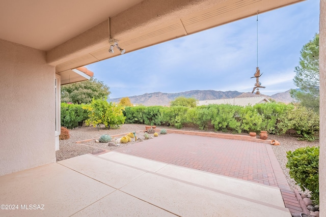 view of patio featuring a mountain view