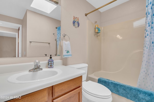 full bathroom with vanity, shower / bath combination with curtain, toilet, and a skylight