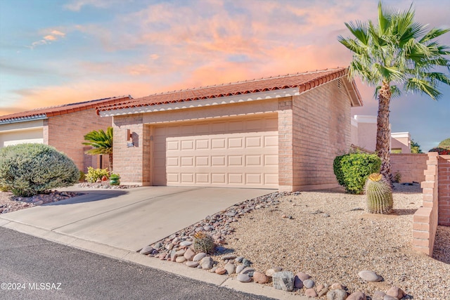 view of front of property featuring a garage