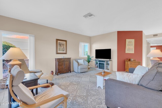 living room with light tile patterned floors