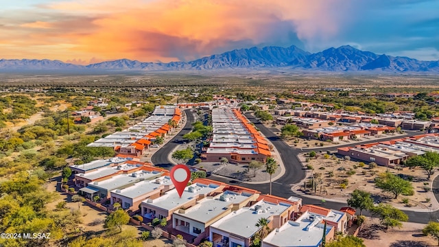 aerial view at dusk with a mountain view