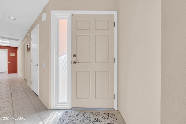 interior space with light tile patterned floors