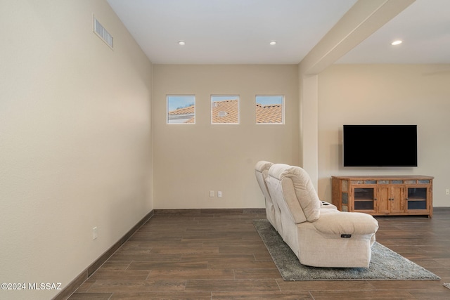 sitting room with dark hardwood / wood-style flooring