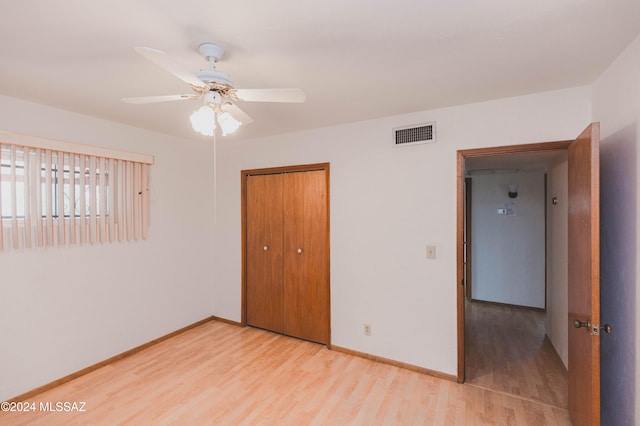 spare room featuring hardwood / wood-style floors