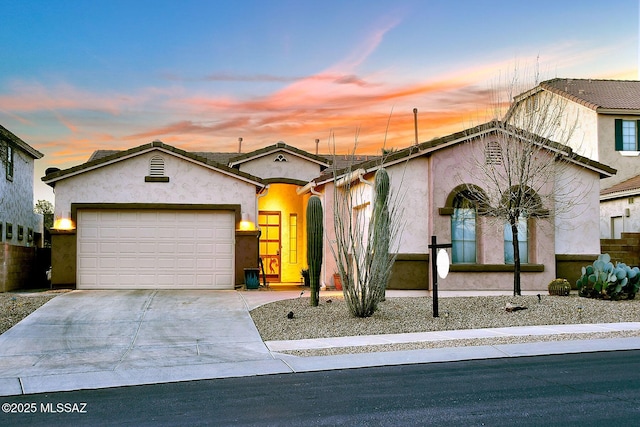 view of front of property featuring a garage