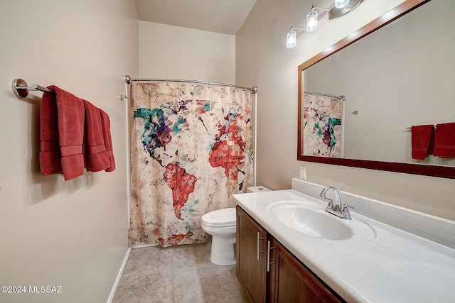 bathroom with toilet and vanity