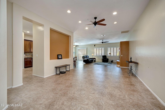 interior space featuring ceiling fan