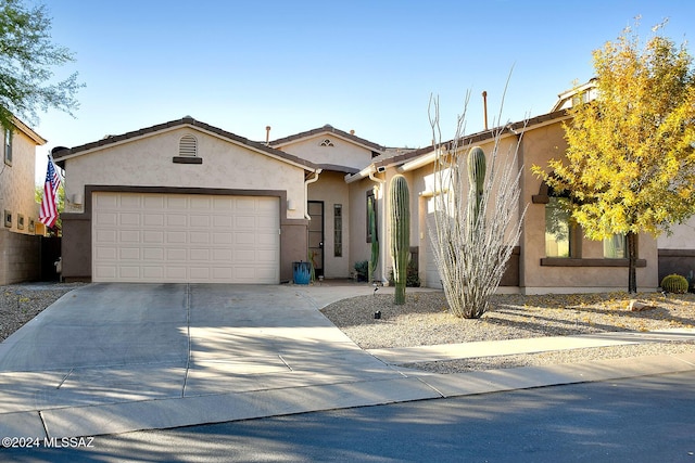 view of front of property with a garage