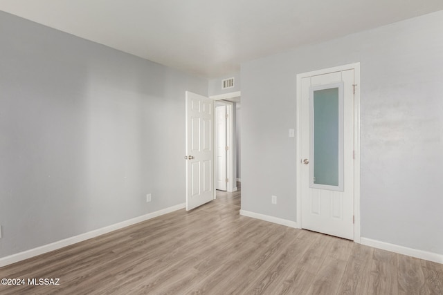 empty room featuring light wood-type flooring