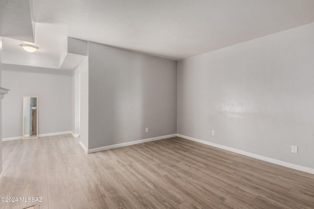 empty room with light wood-type flooring