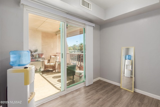 doorway to outside featuring hardwood / wood-style floors