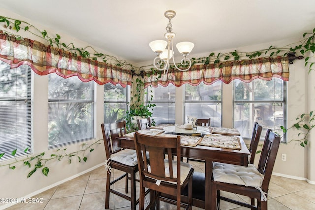 interior space featuring a healthy amount of sunlight and a notable chandelier