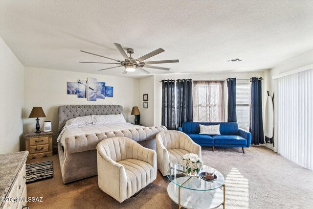 3457 N Crystal Hill Ave, Tucson, AZ 85745 - bedroom featuring dark colored carpet, a ceiling fan, and a textured ceiling