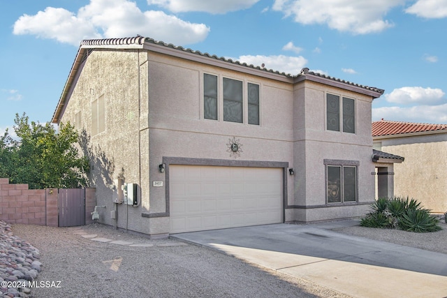 view of front of home with a garage