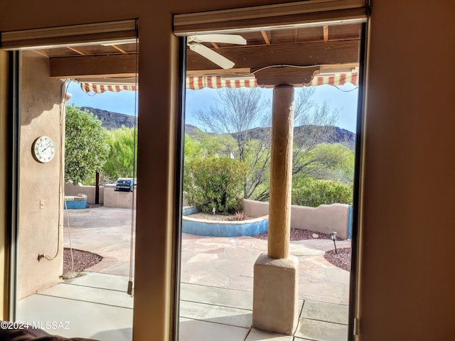 doorway featuring a mountain view