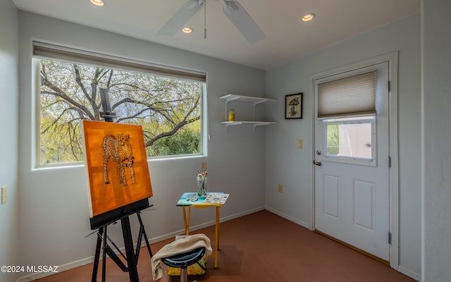 foyer featuring ceiling fan