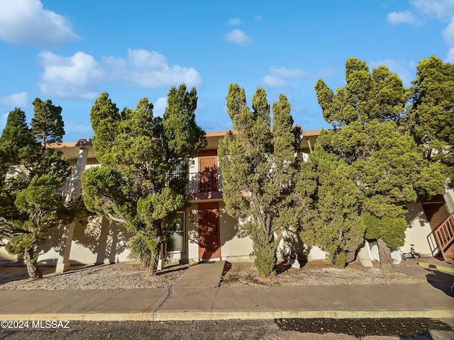 obstructed view of property featuring a balcony