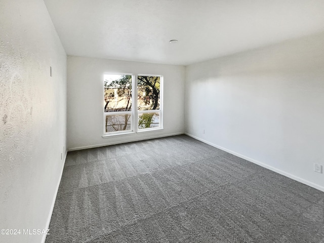 1600 N Wilmot Rd Unit 291, Tucson, AZ 85712 - unfurnished room with carpet and baseboards