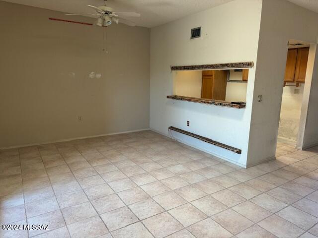 spare room featuring ceiling fan