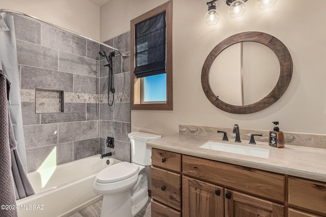 full bathroom with shower / bath combo, toilet, and vanity