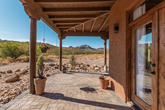 view of patio featuring a mountain view