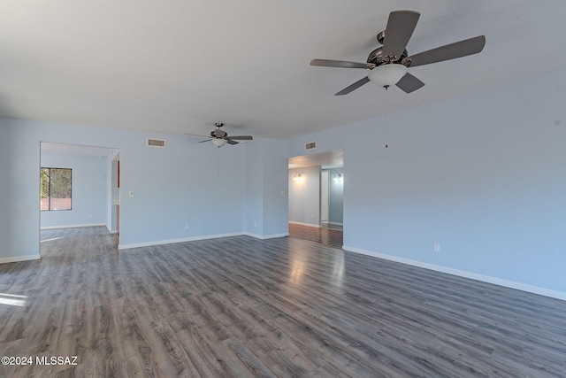 unfurnished living room with ceiling fan and hardwood / wood-style flooring