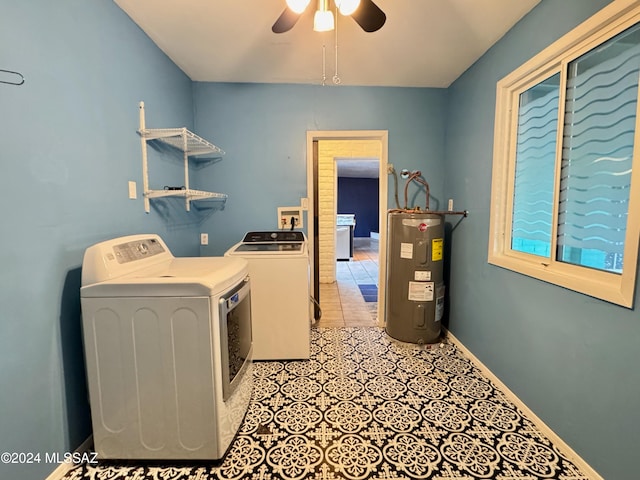 clothes washing area featuring washer and clothes dryer, ceiling fan, and water heater