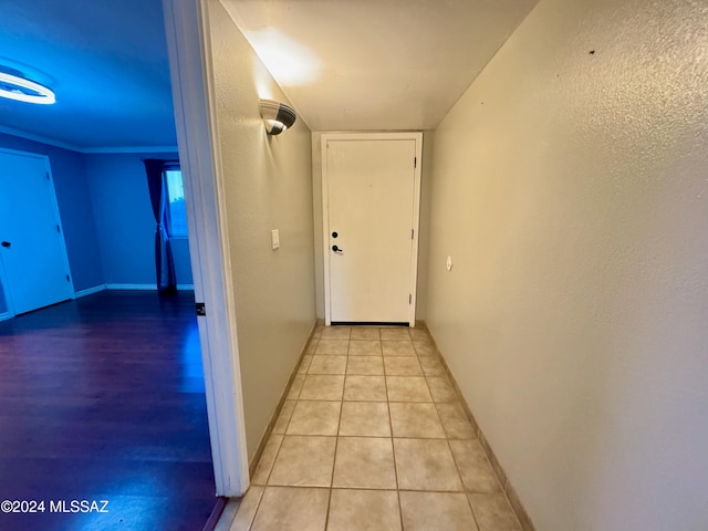 hallway with light tile patterned floors